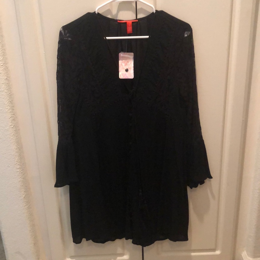 Black free flowing dress.